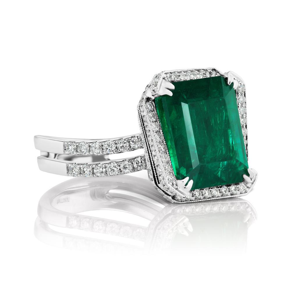 18k White Gold 8.18ct Emerald And 1.18ct Diamond Ring

A dynamic diamond halo surrounds a vibrant rich green 8 ct Emerald
Item: # 03175
Metal: 18k W
Lab: C.dunaigre
Color Weight: 8.18 ct.
Diamond Weight: 1.18 ct.