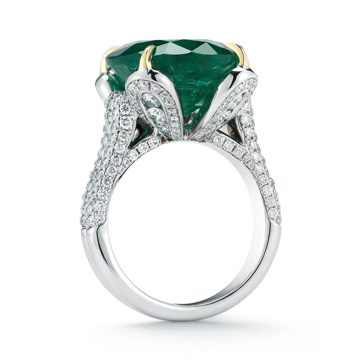 18k White Gold 13.94ct Emerald and 1.98ct Diamond Ring
A romantic petal setting cradles a lovely oval Emerald.
Item: # 01941
Metal: 18k W / Y
Lab: Gia
Color Weight: 13.94 ct.
Diamond Weight: 1.98 ct.