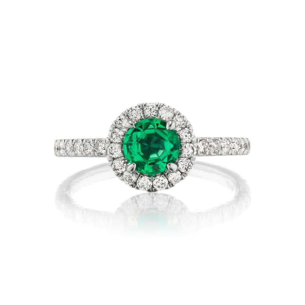 14k White Gold .55ct Emerald And .48ct Diamond Ring

The oval emerald in prong setting reflects the rich green hue of the
stone. Glimmering diamond accents encircle the center stone and adorn
the stone for a luminous edge. This emerald and diamond