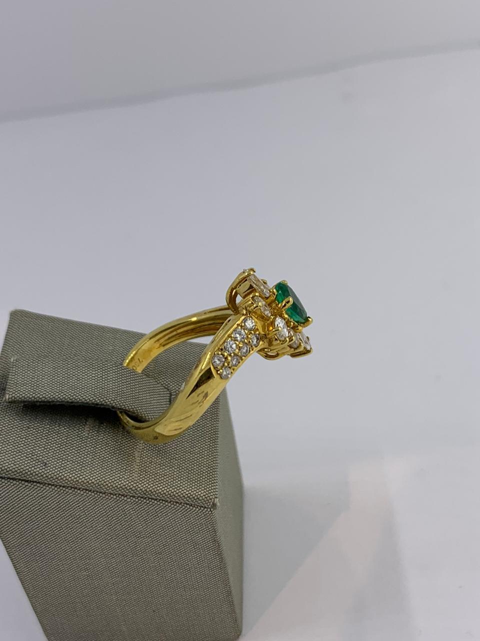 Emerald and Diamond Ring
Emerald 0.40 ct
P Diamonds 0.48ct
R Diamonds 0.42 ct
set in 18kt Yellow Gold
21-11406
