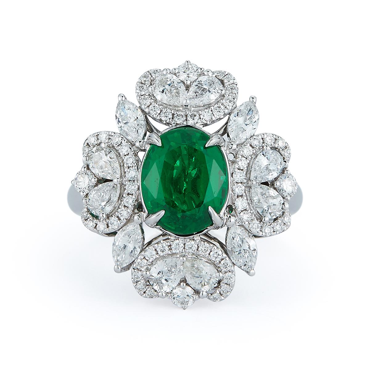 Elaborate diamond scroll designs surround a beautiful oval emerald.
Item:	# 02770
Setting:	18K W
Lab:	GRS
Color Weight:	2.18 ct. of Emerald
Diamond Weight:	1.47 ct. of Di