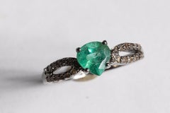 Contemporary Pear-Shaped Columbian Emerald and Diamond Ring in Silver