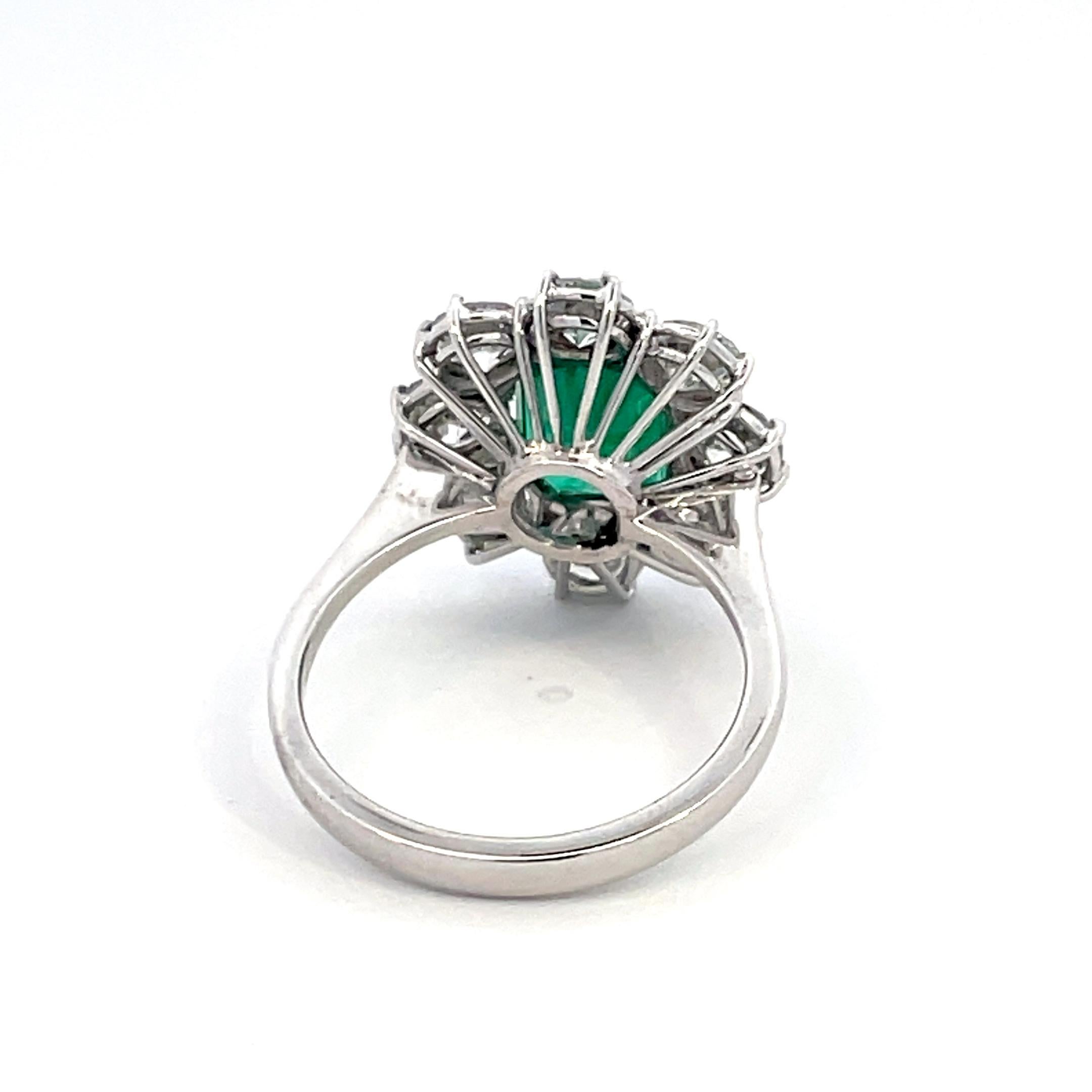 Modern Emerald and Diamond Ring