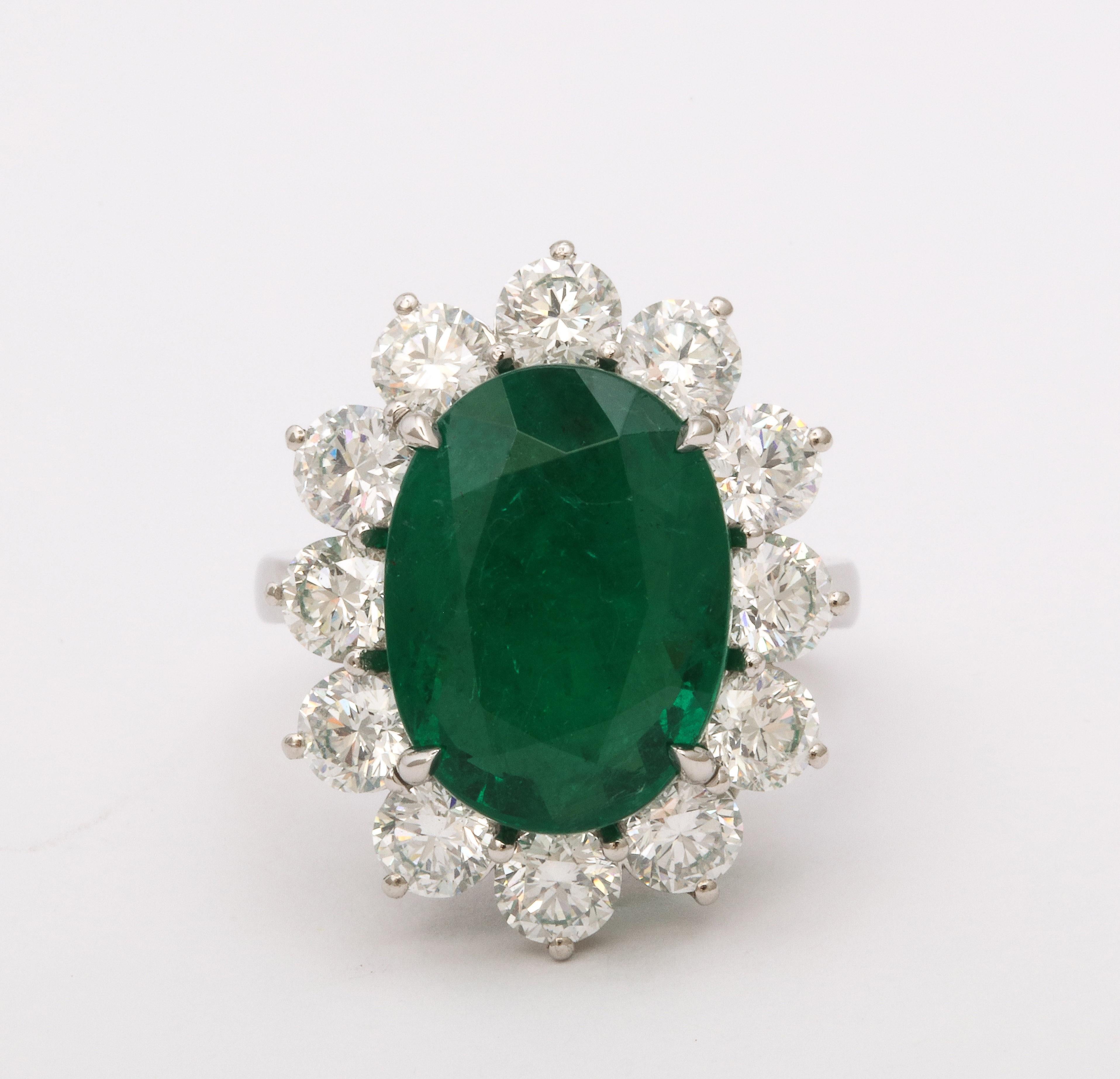 Oval Cut Emerald and Diamond Ring  For Sale