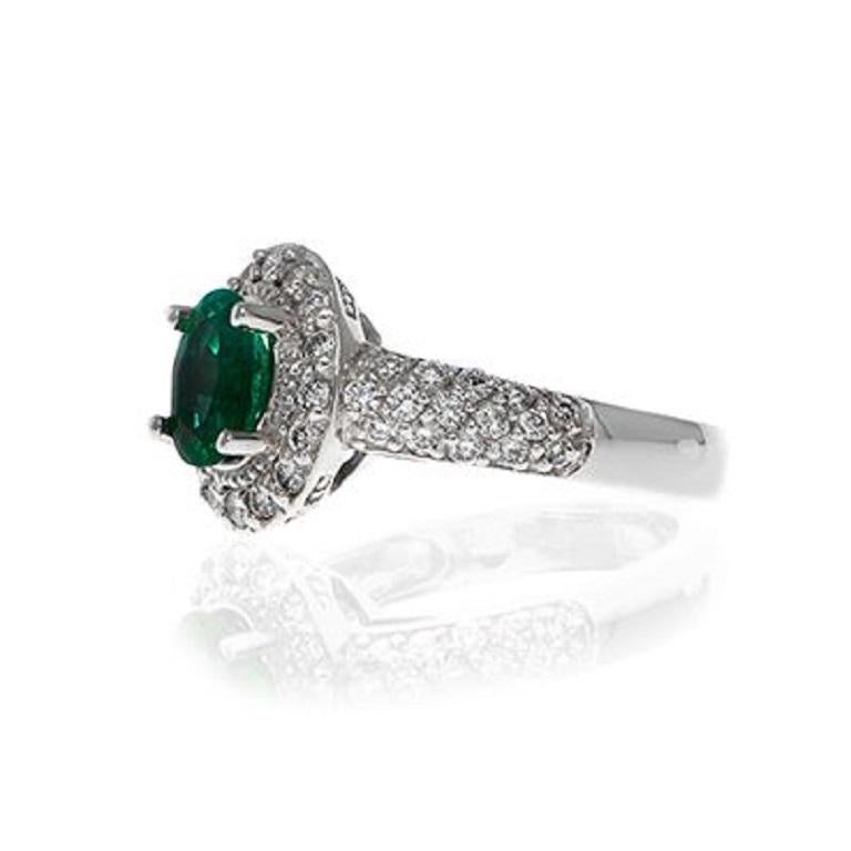 Brilliant Cut 18k White Gold 1.15ct Emerald and .87ct Diamond Ring For Sale