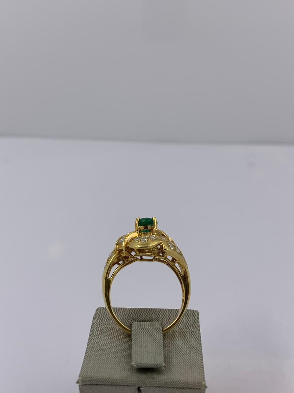 Oval Cut Emerald and Diamond Ring For Sale