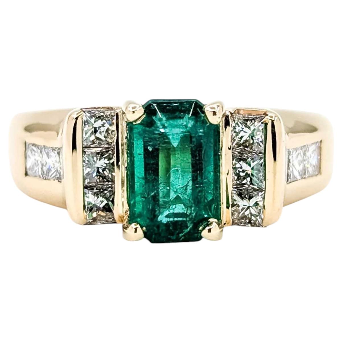 Ring mit Smaragd und Diamant aus 14 Karat Gelbgold