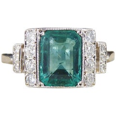 Emerald and Diamond Ring in 18 Carat White Gold
