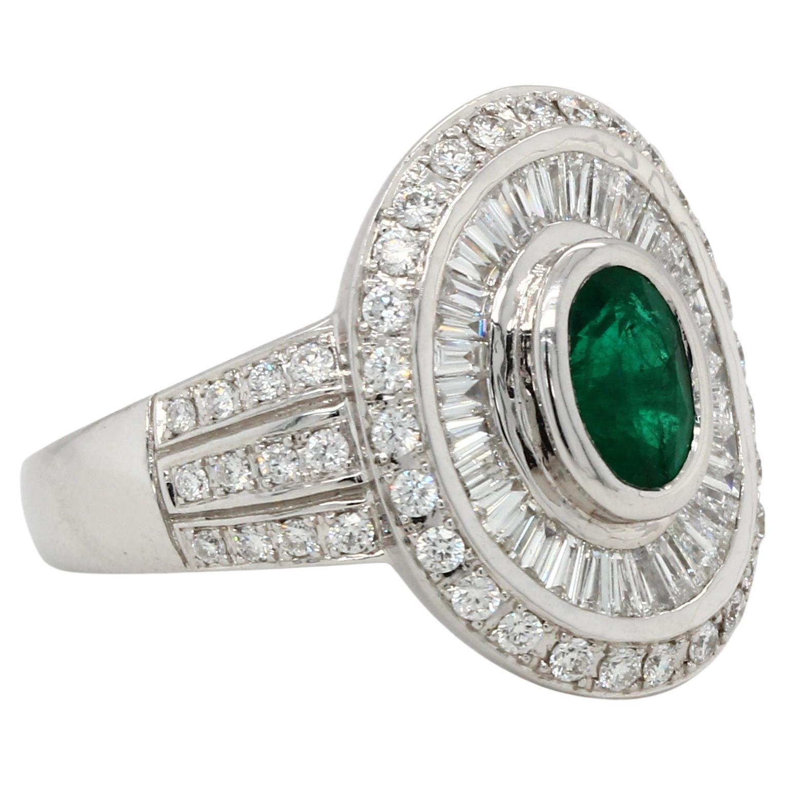 Oval Cut Emerald And Diamond Ring In 18 Karat Gold For Sale