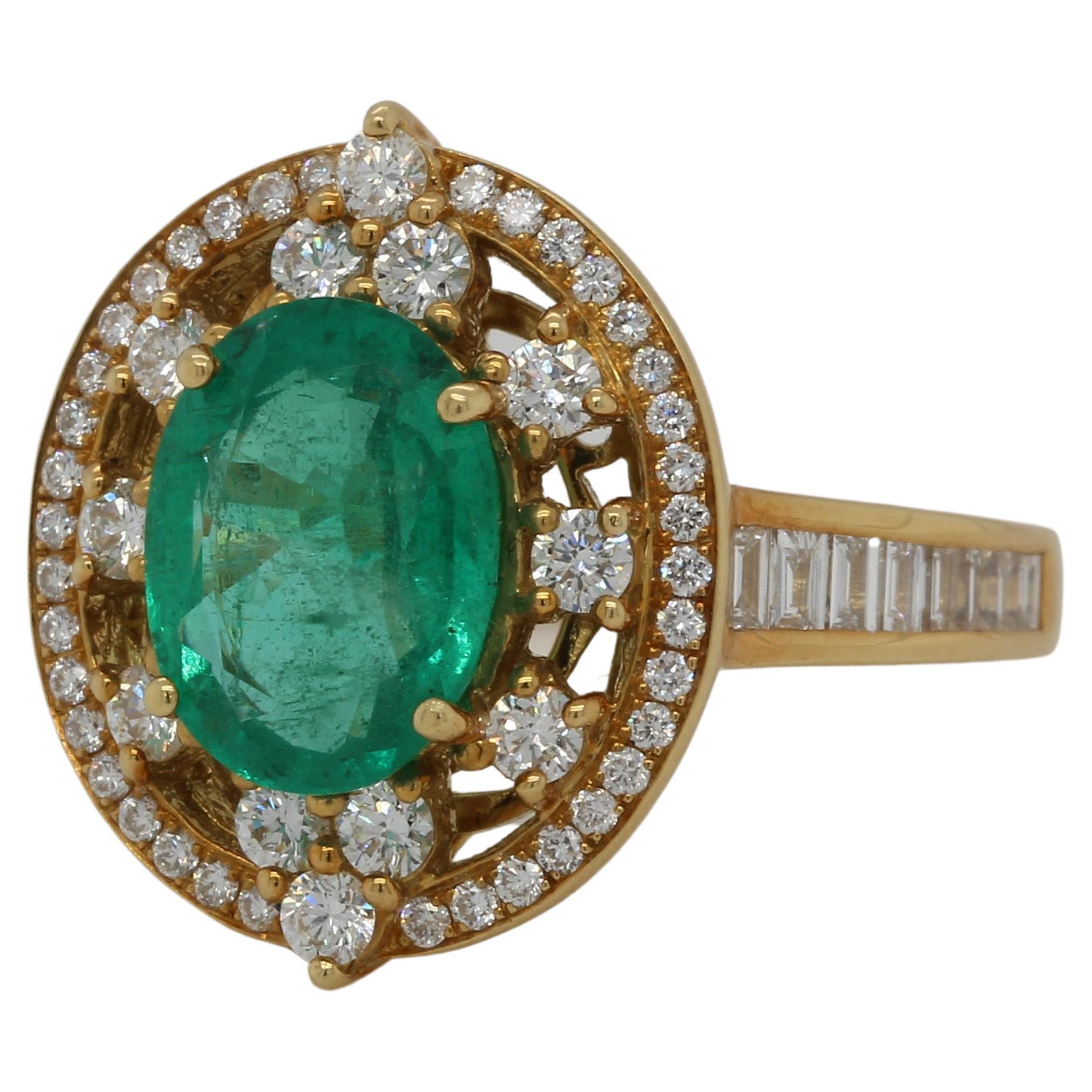 Oval Cut Emerald And Diamond Ring In 18 Karat Gold For Sale
