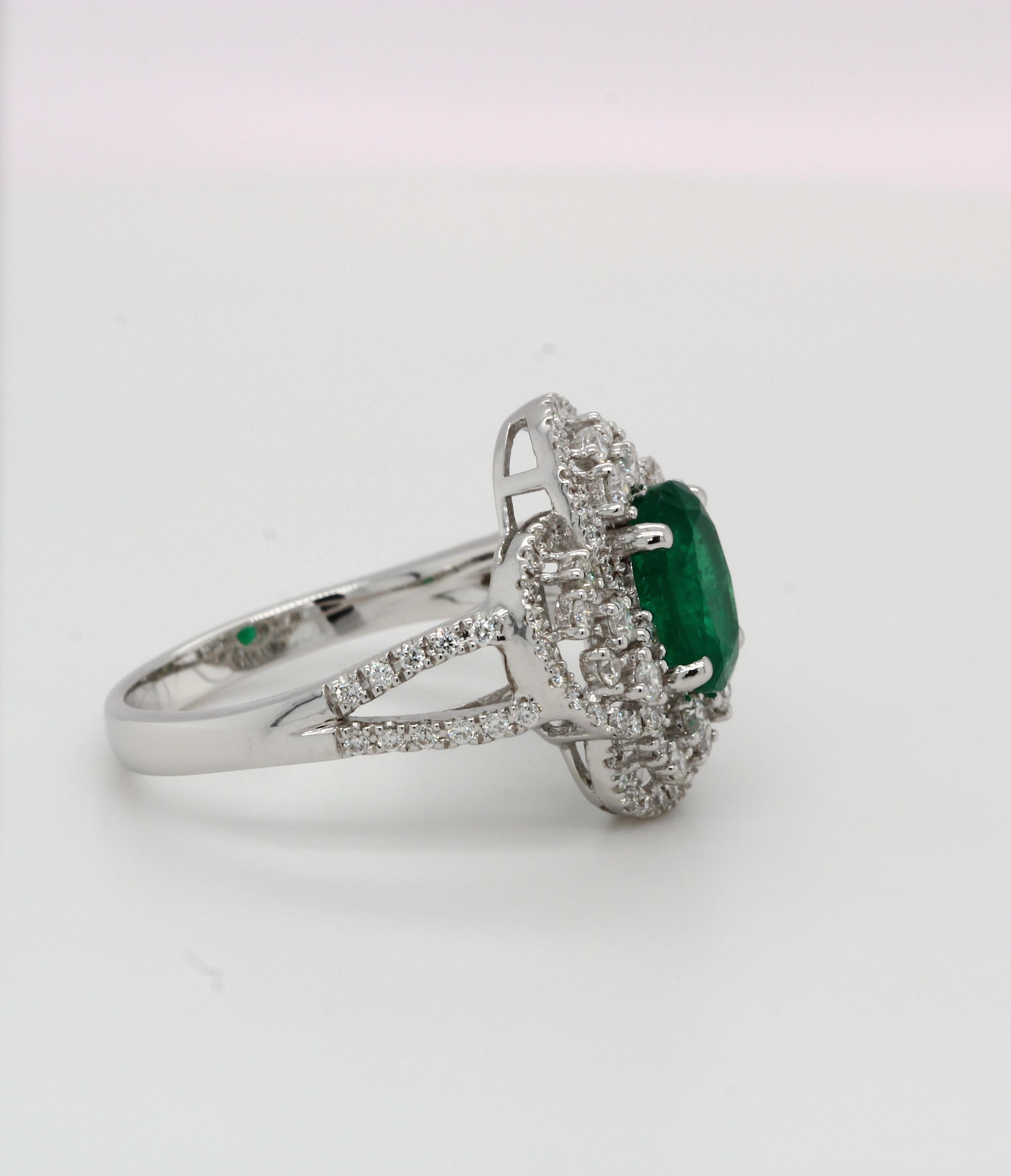 Oval Cut Emerald and Diamond Ring in 18 Karat Gold For Sale