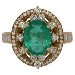 Used Emerald And Diamond Ring In 18 Karat Gold