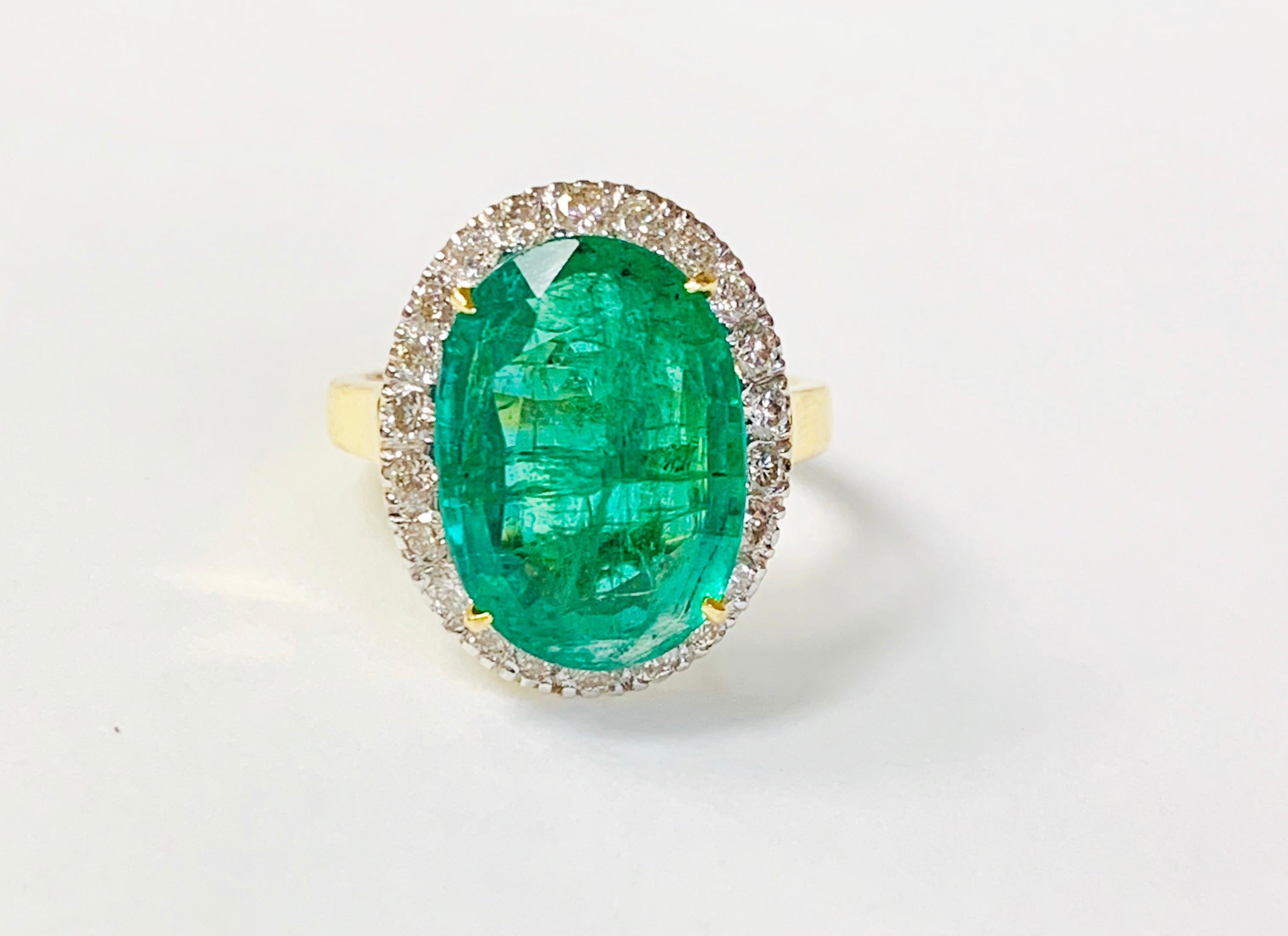 Moguldiam Inc's Emerald and diamond ring beautifully handmade in 18k yellow gold. 

The details are as follows:  
Emerald weight: 6.85 carat 
Diamond weight: 0.77 carat 
Gold weight: 4.68 grams
Ring size : 6 1/2 

 
