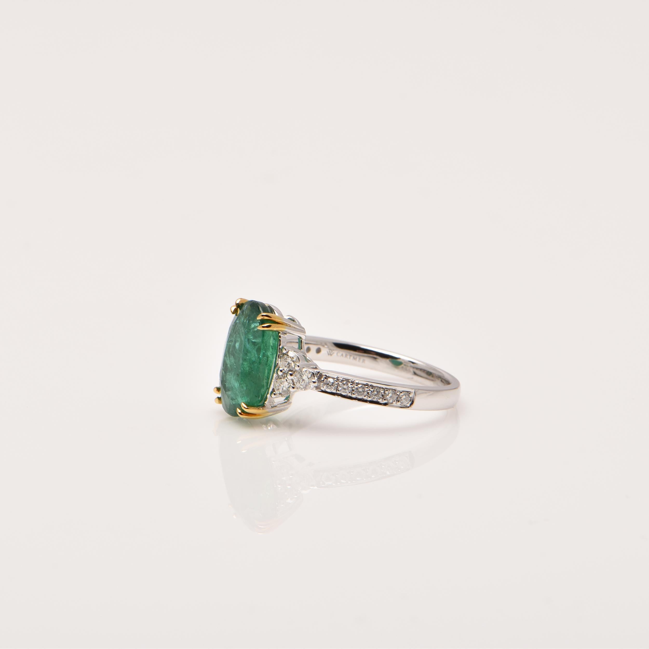 Oval Cut Emerald and Diamond Ring in 18ct White Gold For Sale