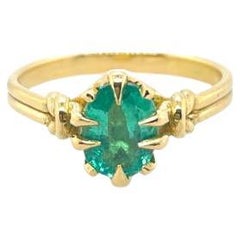 Emerald and diamond ring in 18ct yellow gold 