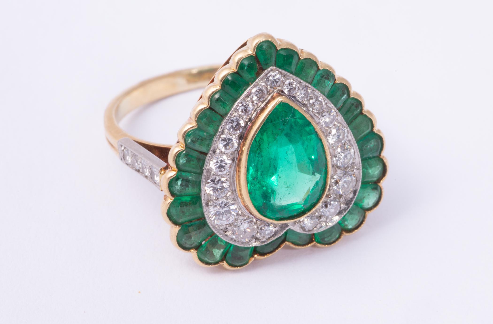 Contemporary Emerald and Diamond Ring in 18 Karat Gold