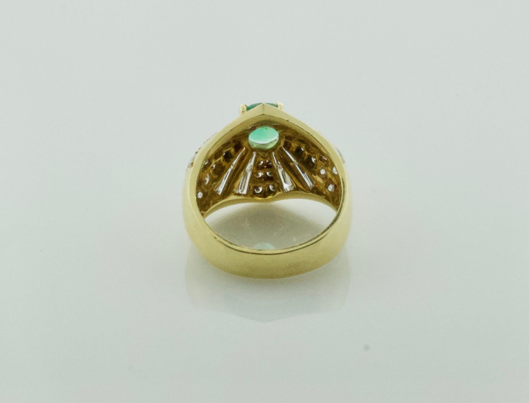 Oval Cut Emerald and Diamond Ring in 18 Karat 