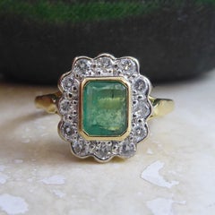 Emerald and Diamond Ring in a Square Cluster Style in Yellow and White Gold