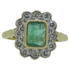 Vintage Emerald and Diamond Ring in a Square Cluster Style in Yellow and White Gold