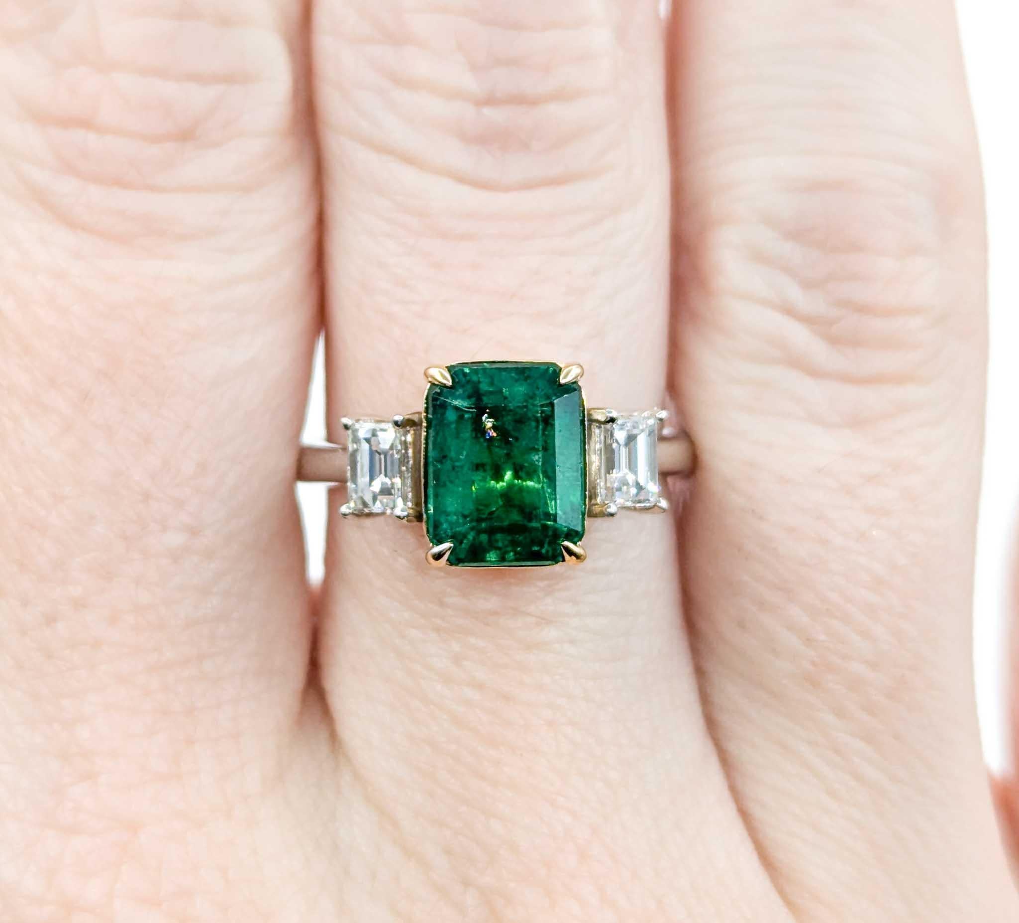 Emerald Cut Emerald and Diamond Ring in Platinum/18k Yellow Gold