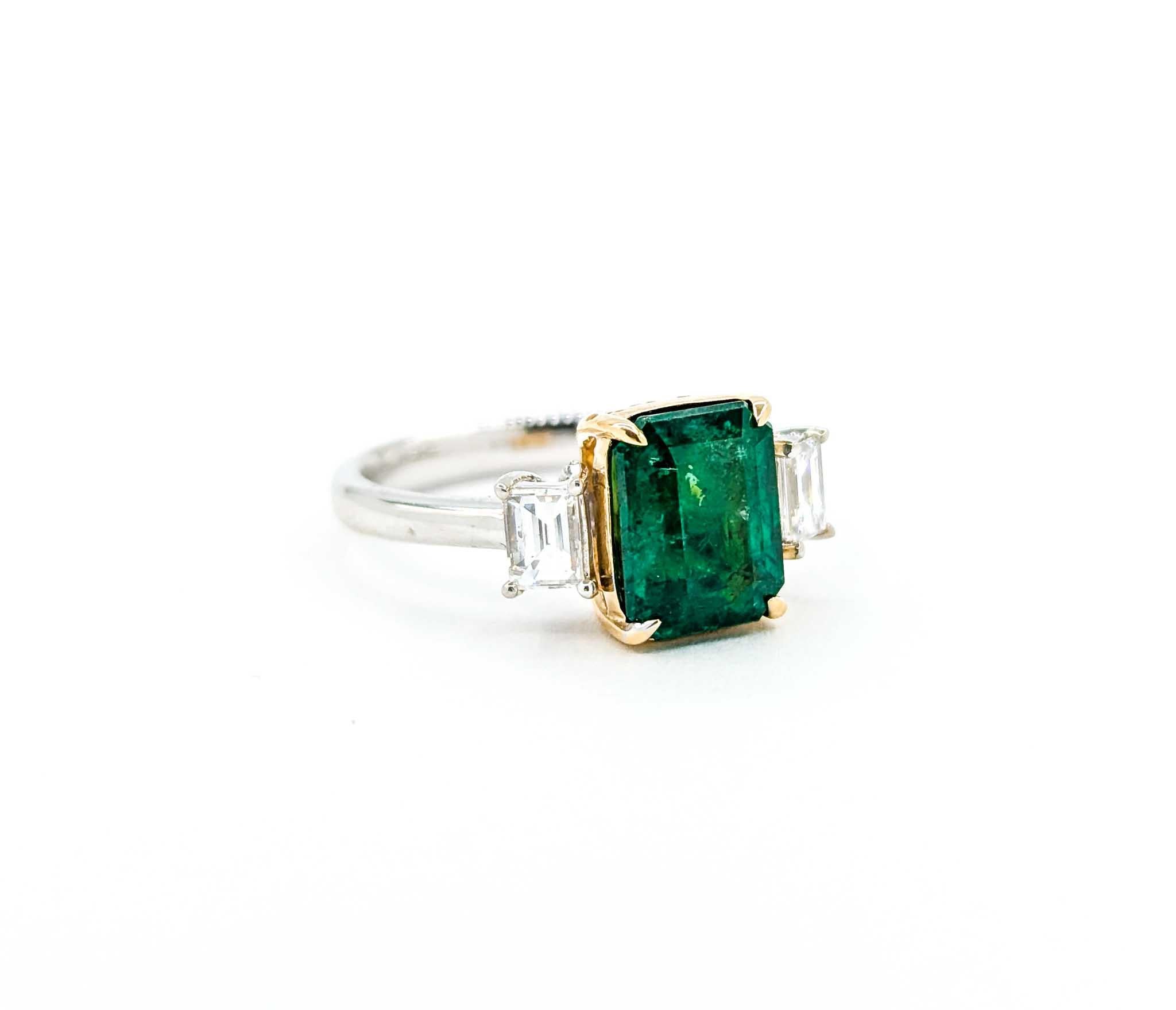 Women's Emerald and Diamond Ring in Platinum/18k Yellow Gold
