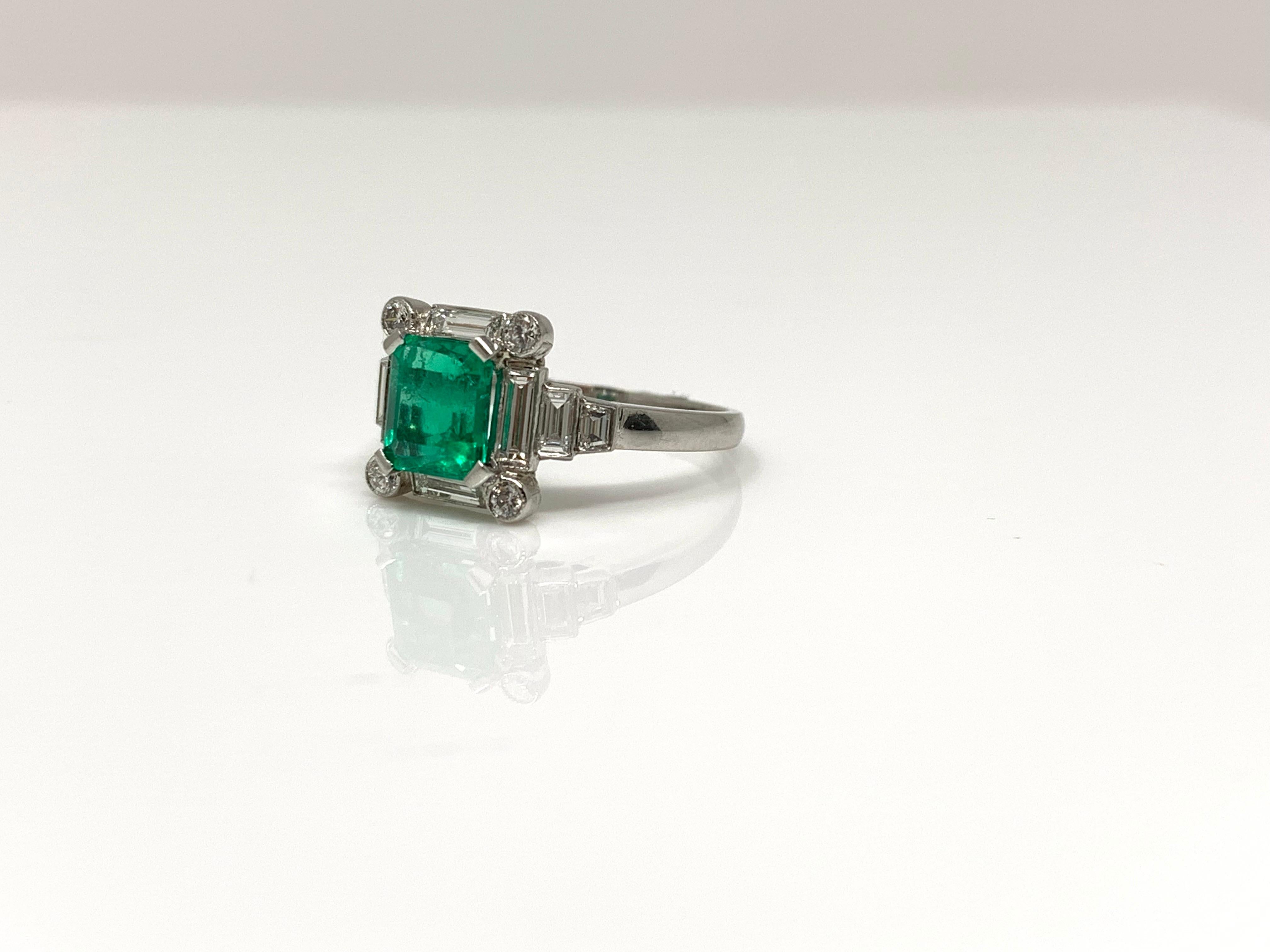 This beautiful and one of a kind natural luscious green emerald and diamond ring is wonderfully handcrafted in Platinum. 
Emerald weight : 1.40 carat 
Diamond weight : 0.74 carat 
Metal : Platinum 
Ring size : 6 1/2 
