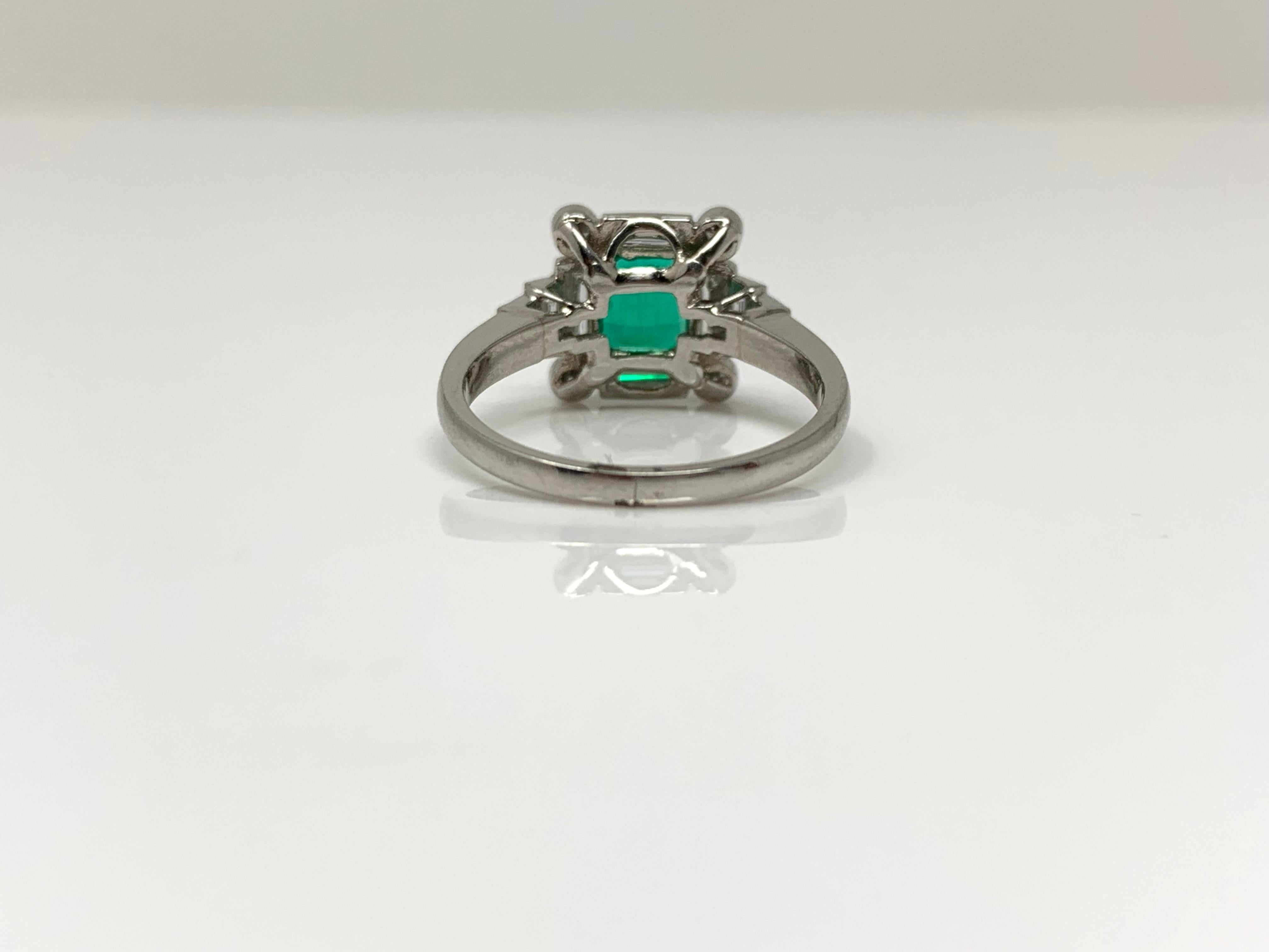 Women's or Men's Emerald and Diamond Ring in Platinum For Sale