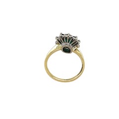 Anello con smeraldo e diamante incastonato in oro giallo e bianco 18 ct.