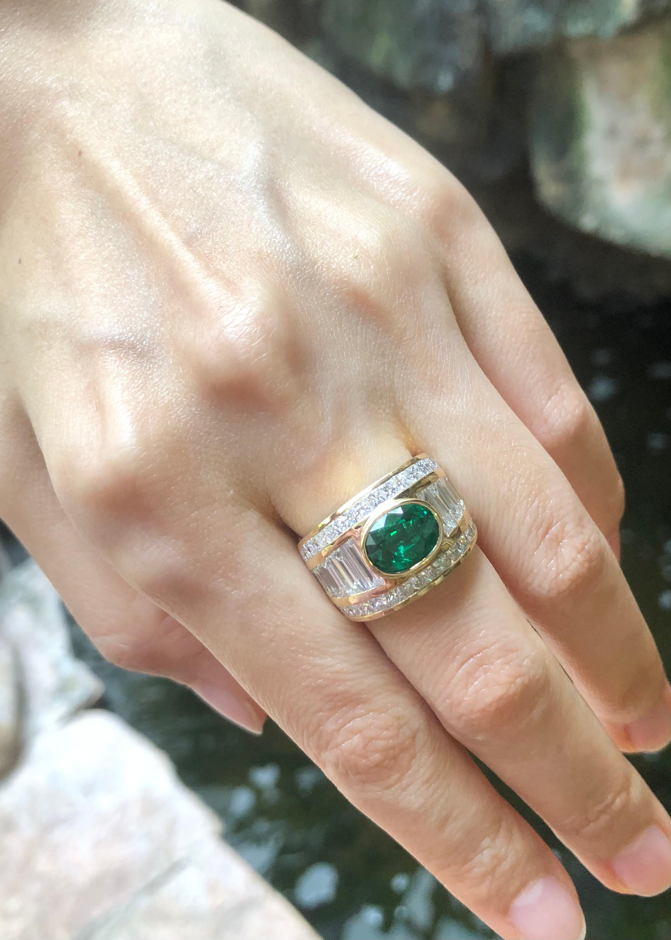 Emerald 2.01 carats and Diamond 4.09 carats Ring set in 18K Gold Settings

Width:  2.0 cm 
Length: 1.5 cm
Ring Size: 53
Total Weight: 13.43 grams

