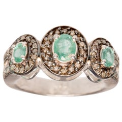 Anello con smeraldo e diamante in argento