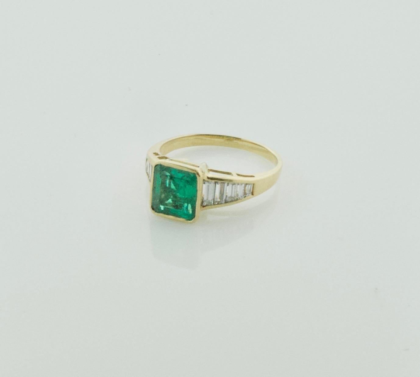 Emerald Cut Emerald and Diamond Solitaire Ring in 18 Karat Yellow Gold For Sale
