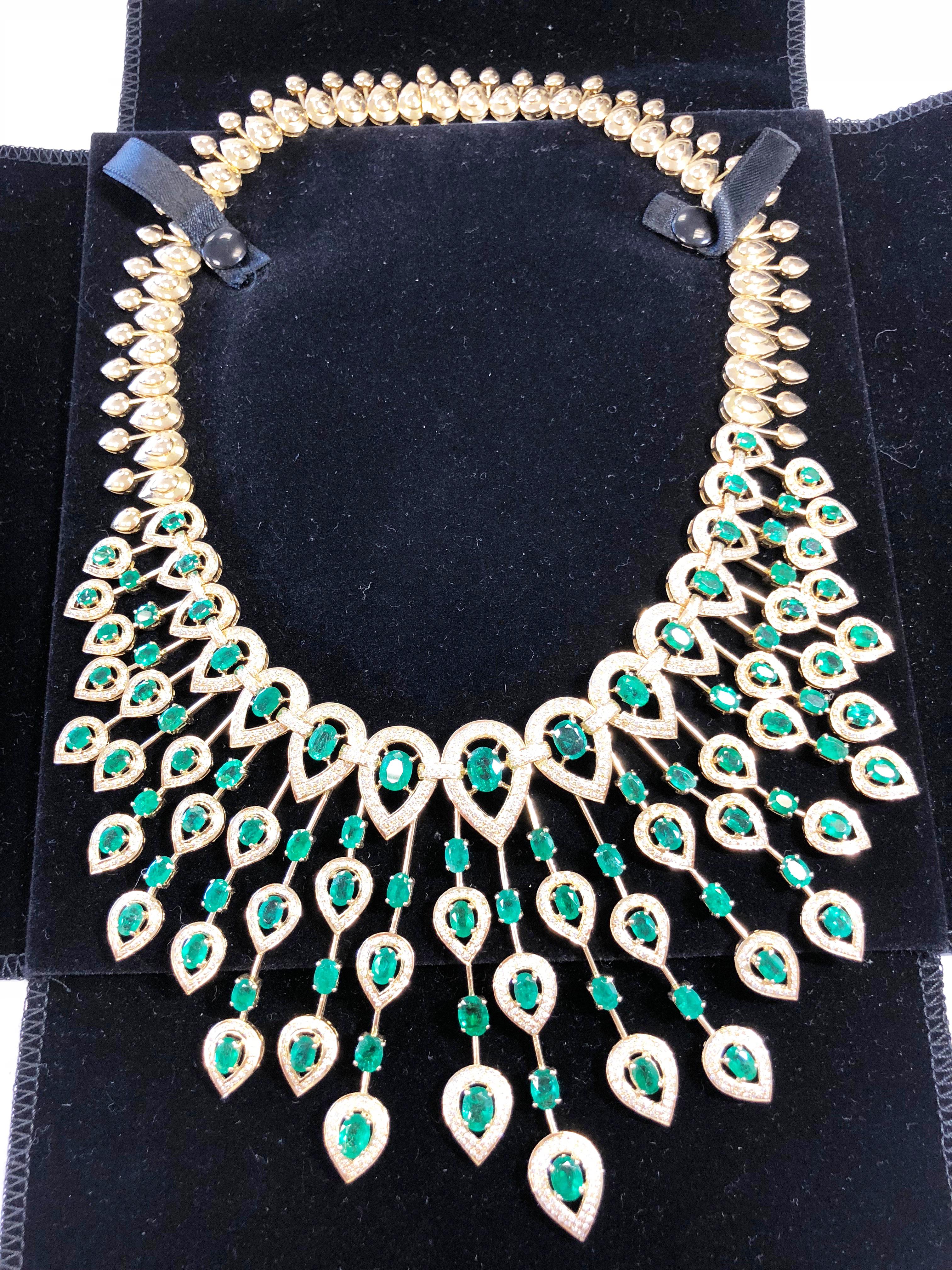 Breathtaking emerald and white diamond spray design necklace in 14k yellow gold and 17