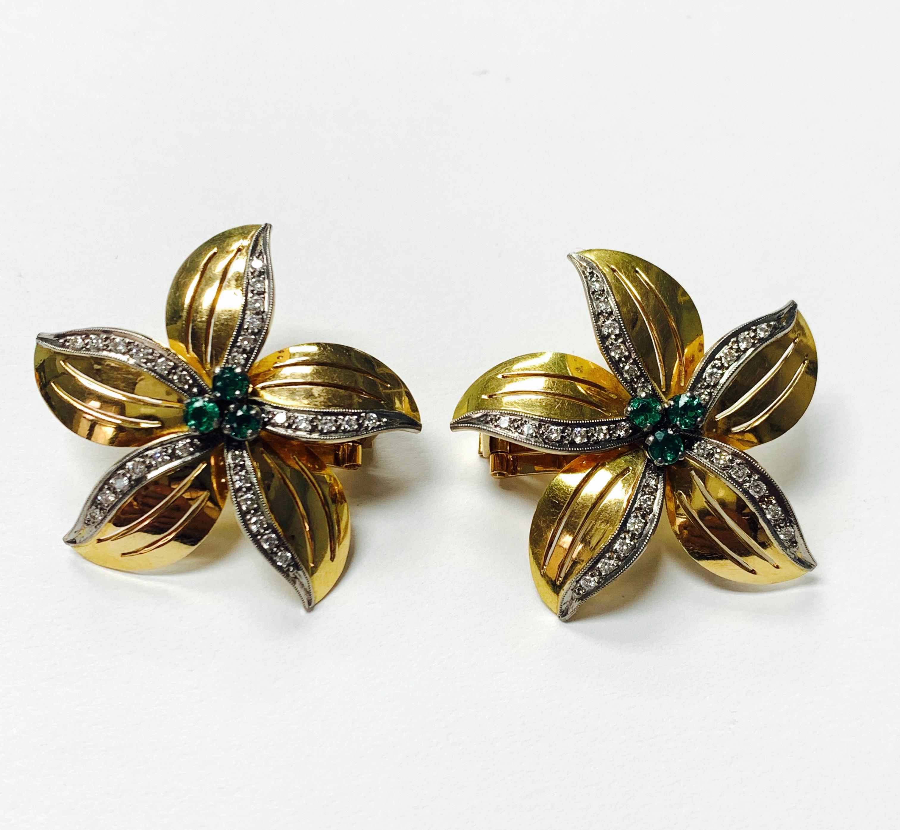 Emerald and diamond stud earrings handcrafted in 18k yellow gold. 
The details are as follows ; 
Diamond weight : 1.80 carat ( H color and VS2 clarity) 
Emerald weight : 0.60 carat 
Measurements ; 1 1/2 by 1 1/2
Metal : 18k yellow gold 
