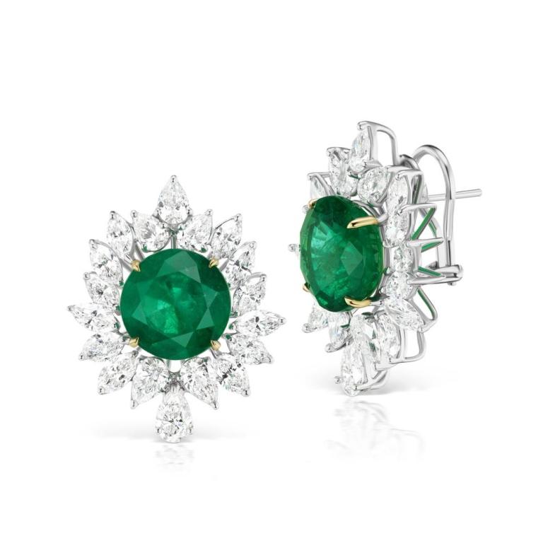 EMERALD AND DIAMOND STUD A substantial diamond halo surrounds a high quality oval emerald on each ear. A classic style that has graced many at the red carpet, this versatile Emerald earring can actually be worn three different ways Item: # 03419