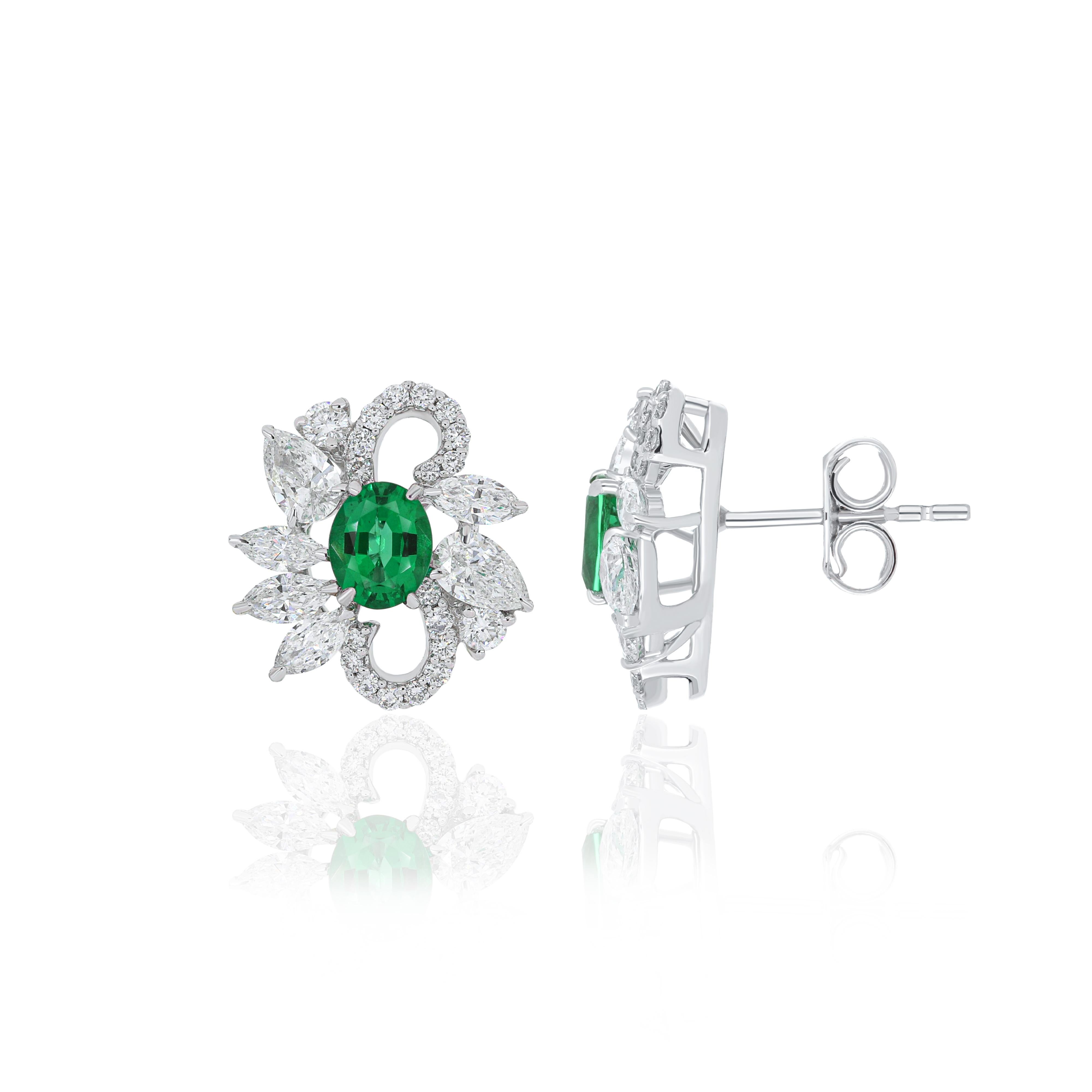 Oval Cut Emerald and Diamond Studded Earring in 18 Karat White Gold handcraft Earring For Sale