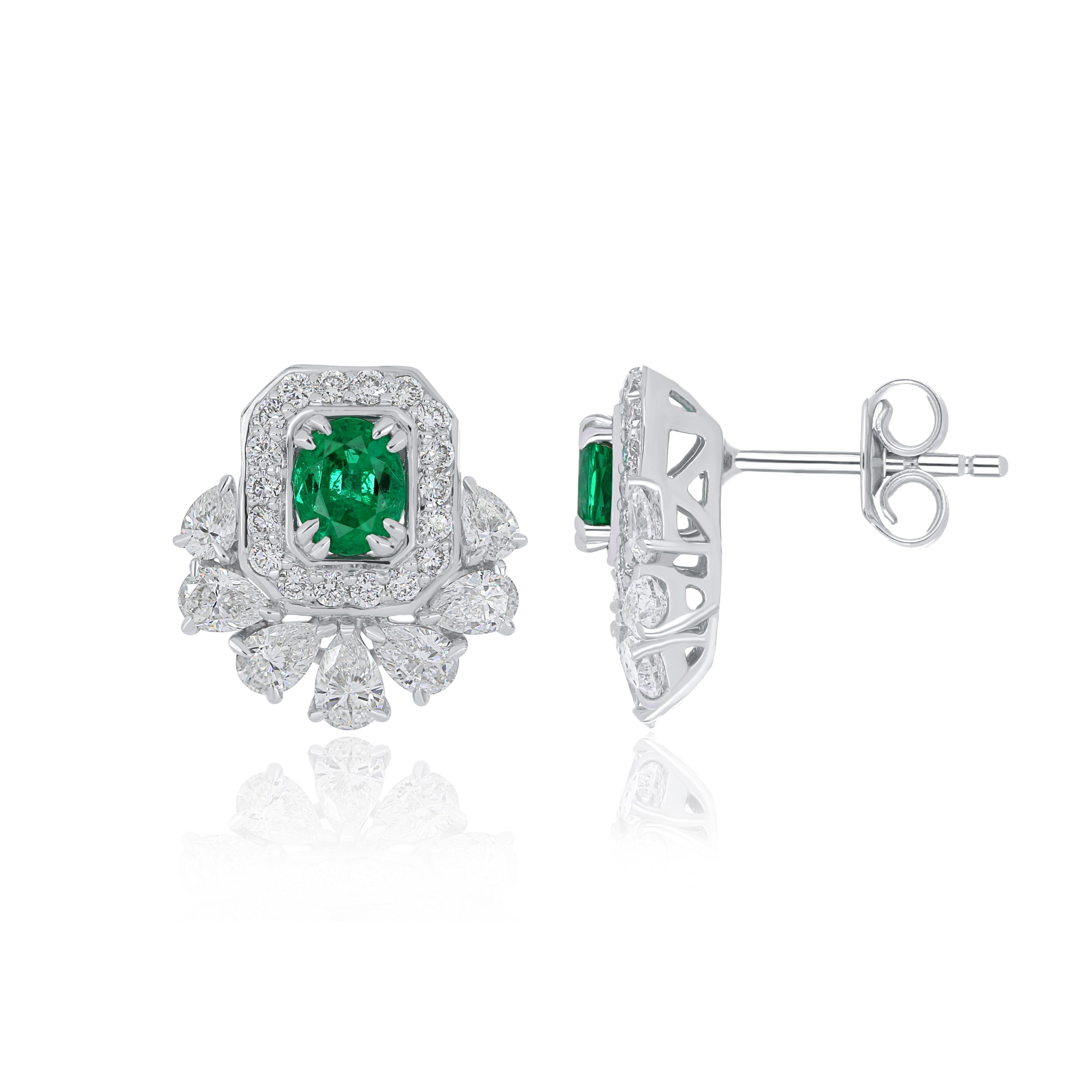 Oval Cut Emerald and Diamond Studded Earrings in 18 Karat White Gold Handcraft Jewelry For Sale