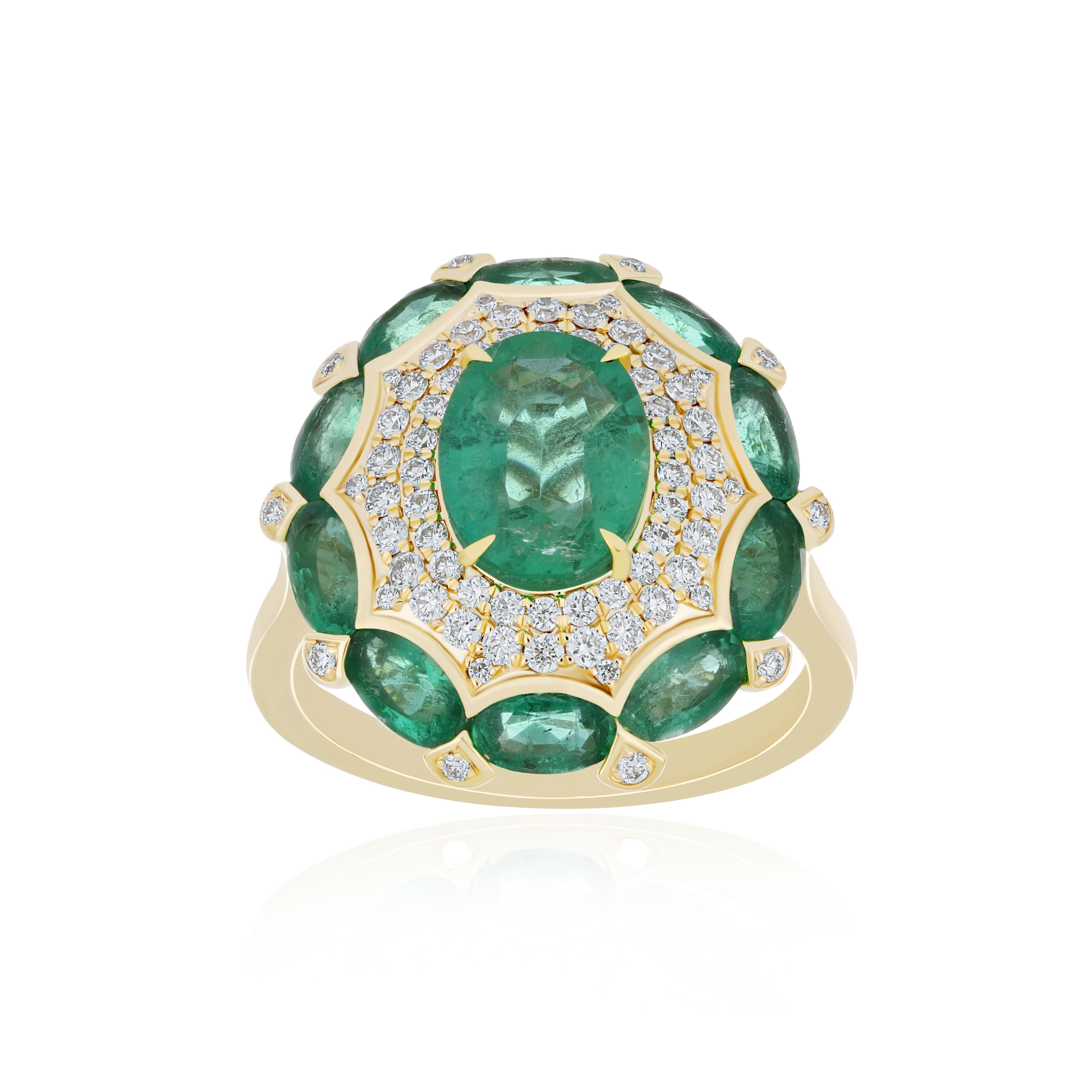 Elegant and Exquisitely detailed Yellow Gold Ring, with 3.8 Cts (approx.) Oval Brilliant Cut Emerald set in the center beautifully accented with Micro pave set Diamond and Emerald, Daimond weighing approx. 0.45 CT's (approx.). total carat weight to