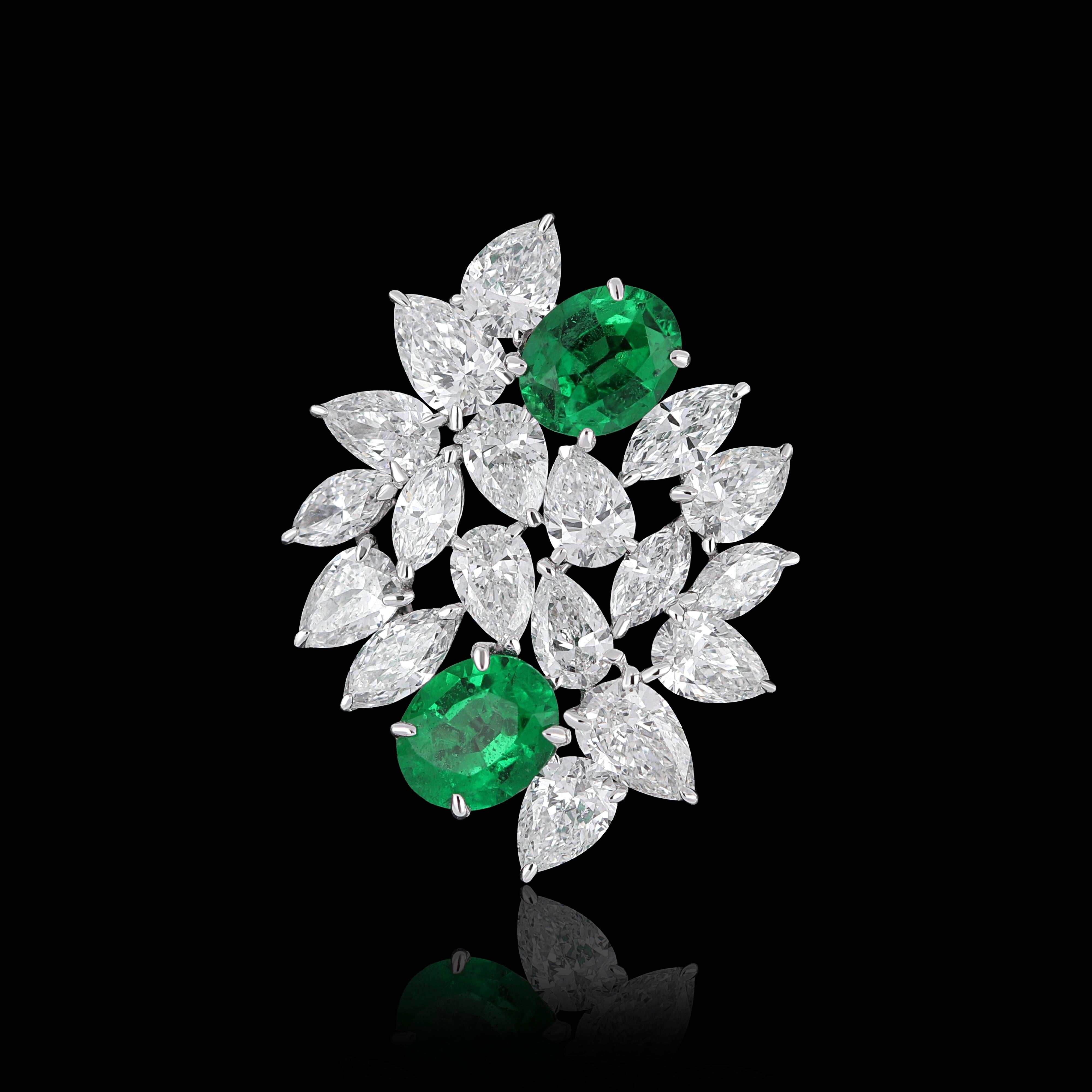 Elegant and exquisitely detailed 18 Karat White Gold Pendant, center set with 0.66 Cts .Oval Shape Emerald and micro pave set Diamonds, weighing approx. 1.51 Cts Beautifully Hand crafted in 18 Karat White Gold.

Stone Detail:
Emerald: 5x4MM

Stone