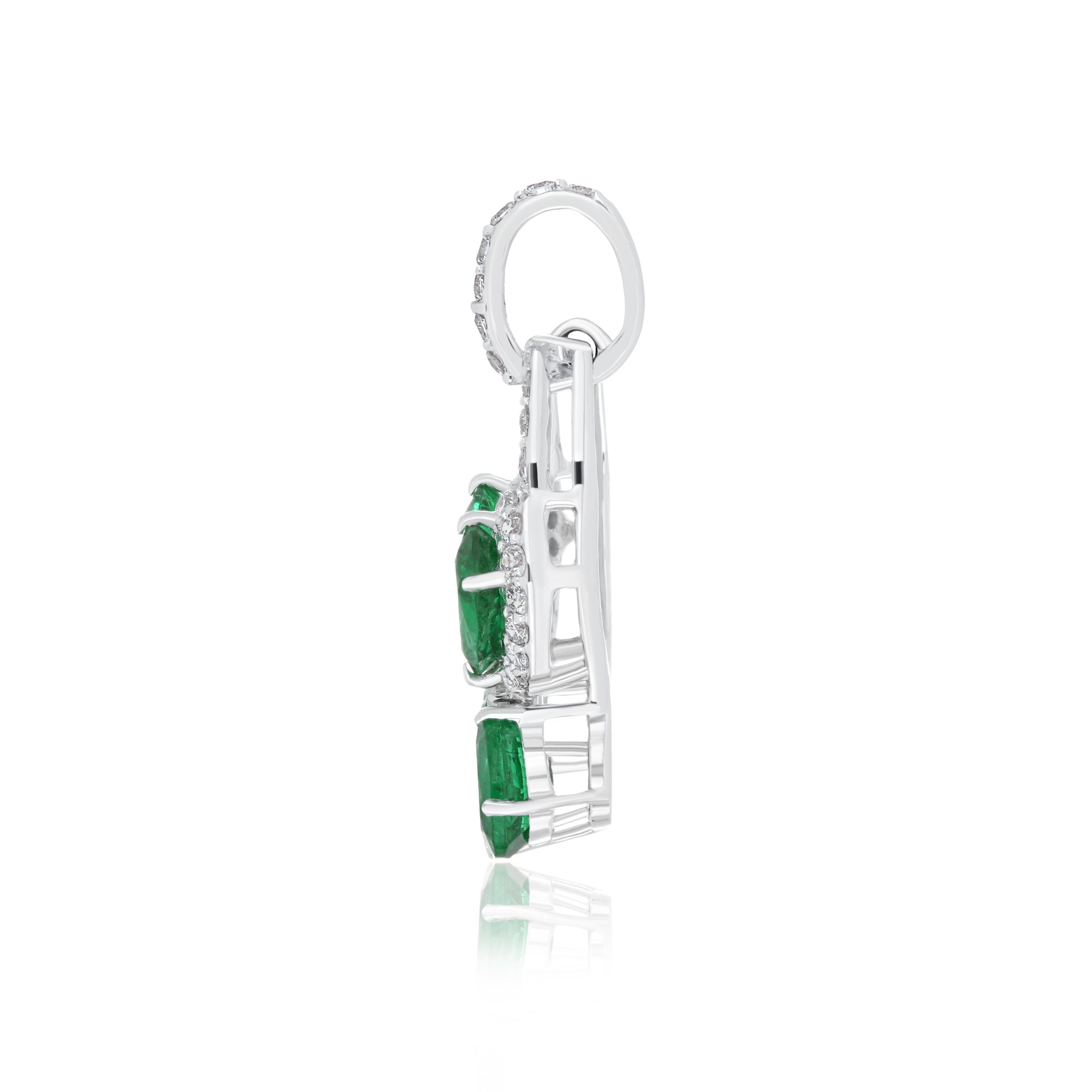 Oval Cut Emerald and Diamond Studded Pendant in 18 Karat White Gold For Sale