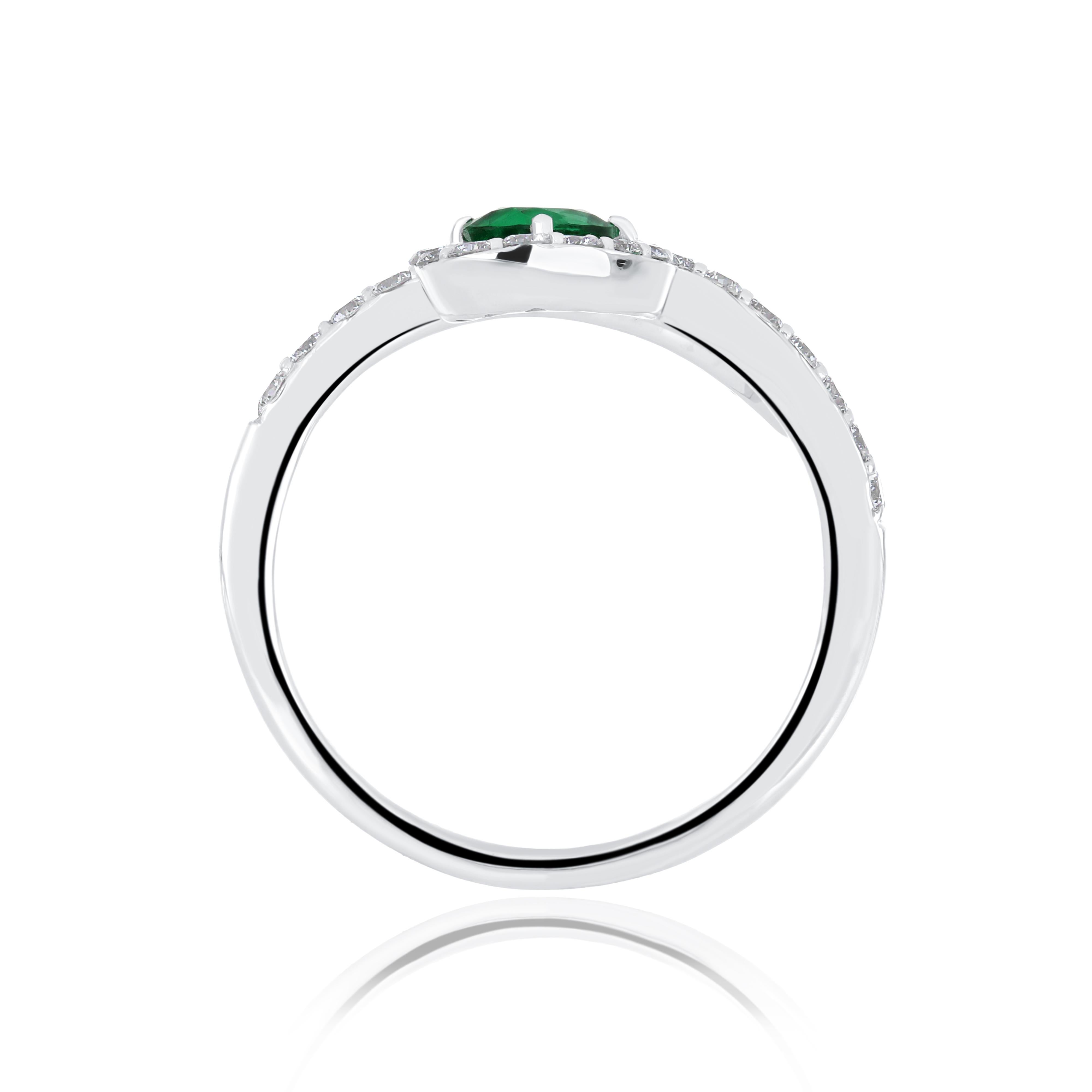 For Sale:  Emerald and Diamond Studded Ring in 18 Karat White Gold 5