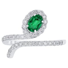 Emerald and Diamond Studded Ring in 18 Karat White Gold