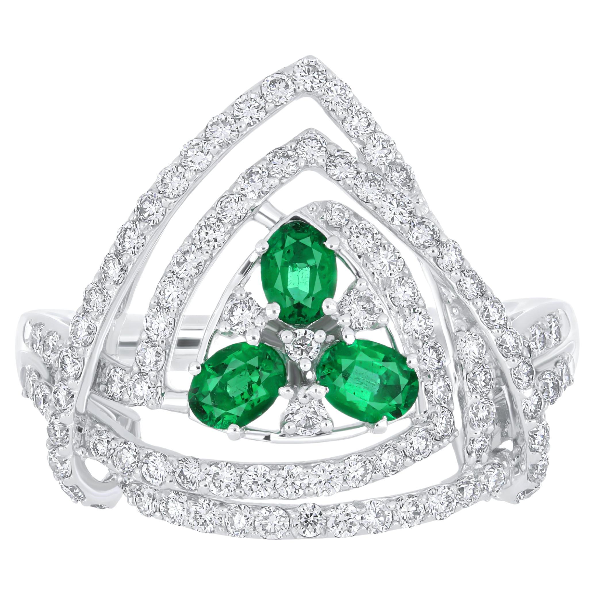 For Sale:  Emerald and Diamond Studded Ring in 18 Karat White Gold