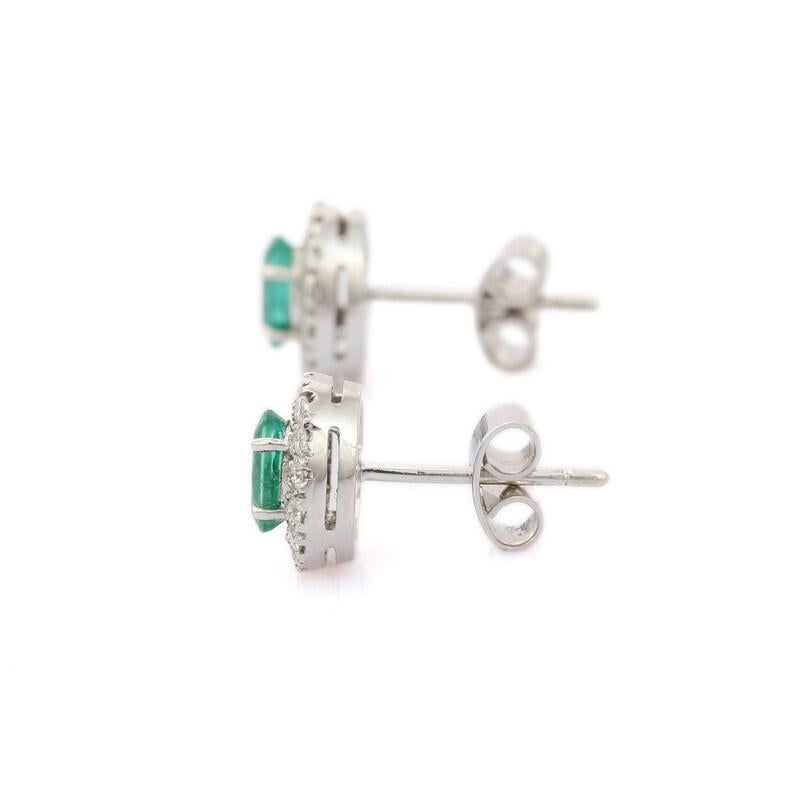 Oval Cut Dainty Emerald Diamond Studs in 18 Karat Solid White Gold For Sale