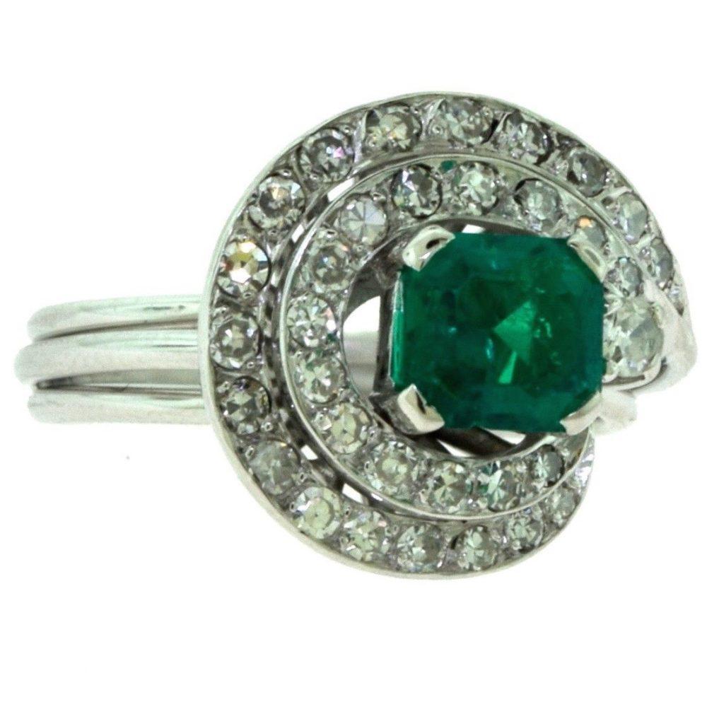 emerald swirl engagement ring