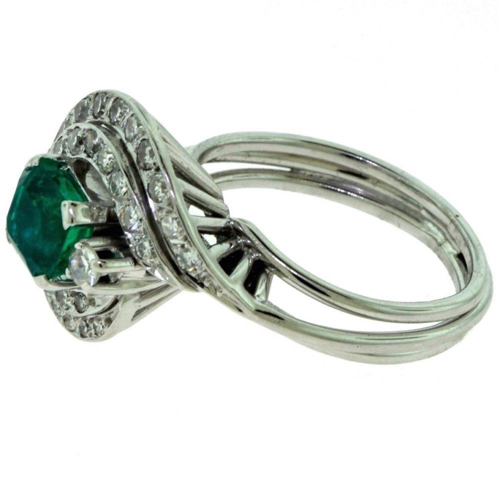 Emerald and Diamond Swirl Engagement Ring In Good Condition For Sale In Miami, FL