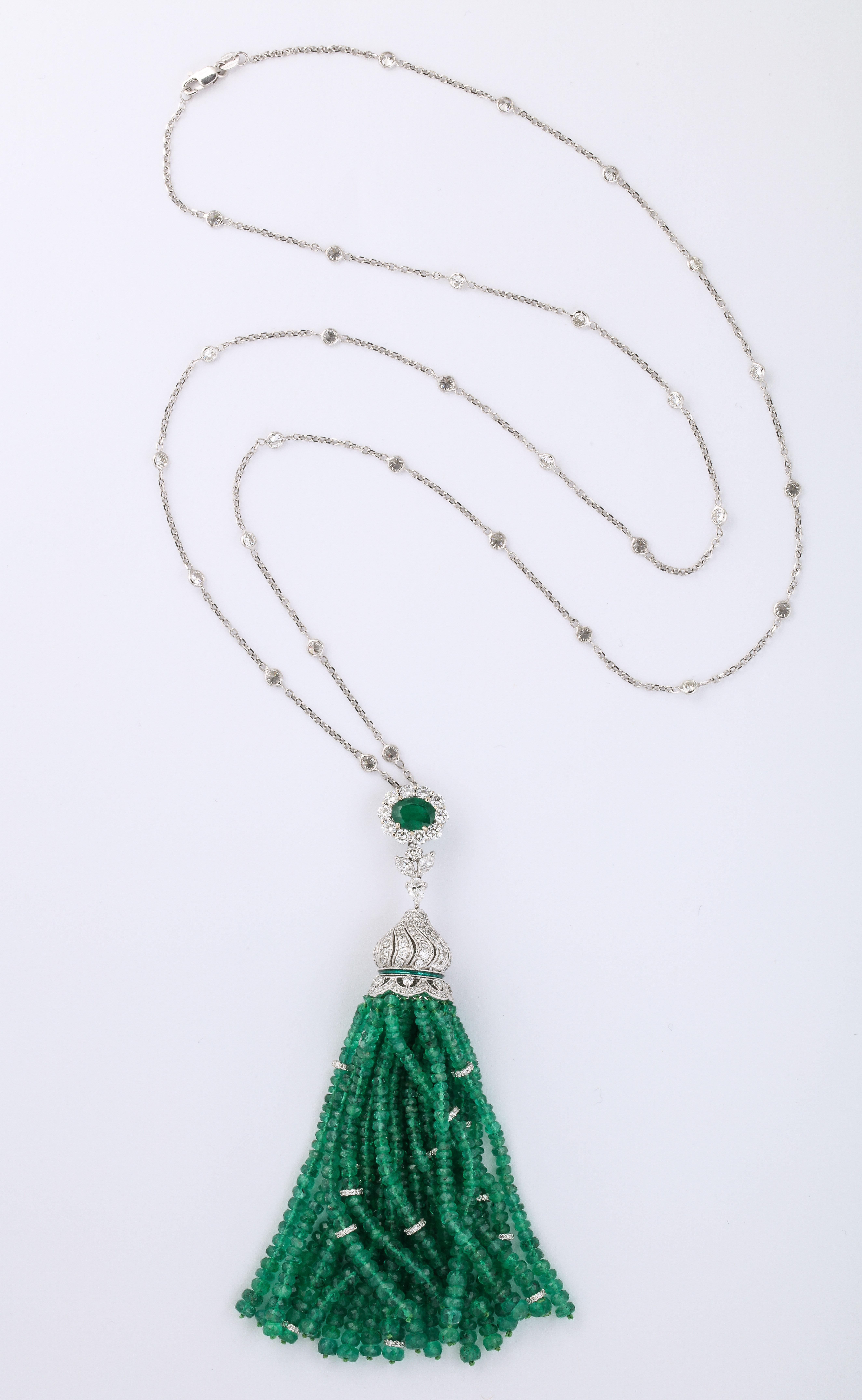 An important Emerald and Diamond Tassel Necklace

118 carats of fine Emerald and 8.33 carats of white round brilliant diamonds. 

30 inch removable diamond by yard chain, set in white gold. The tassel measures 4 inches in length. 

A fabulous piece