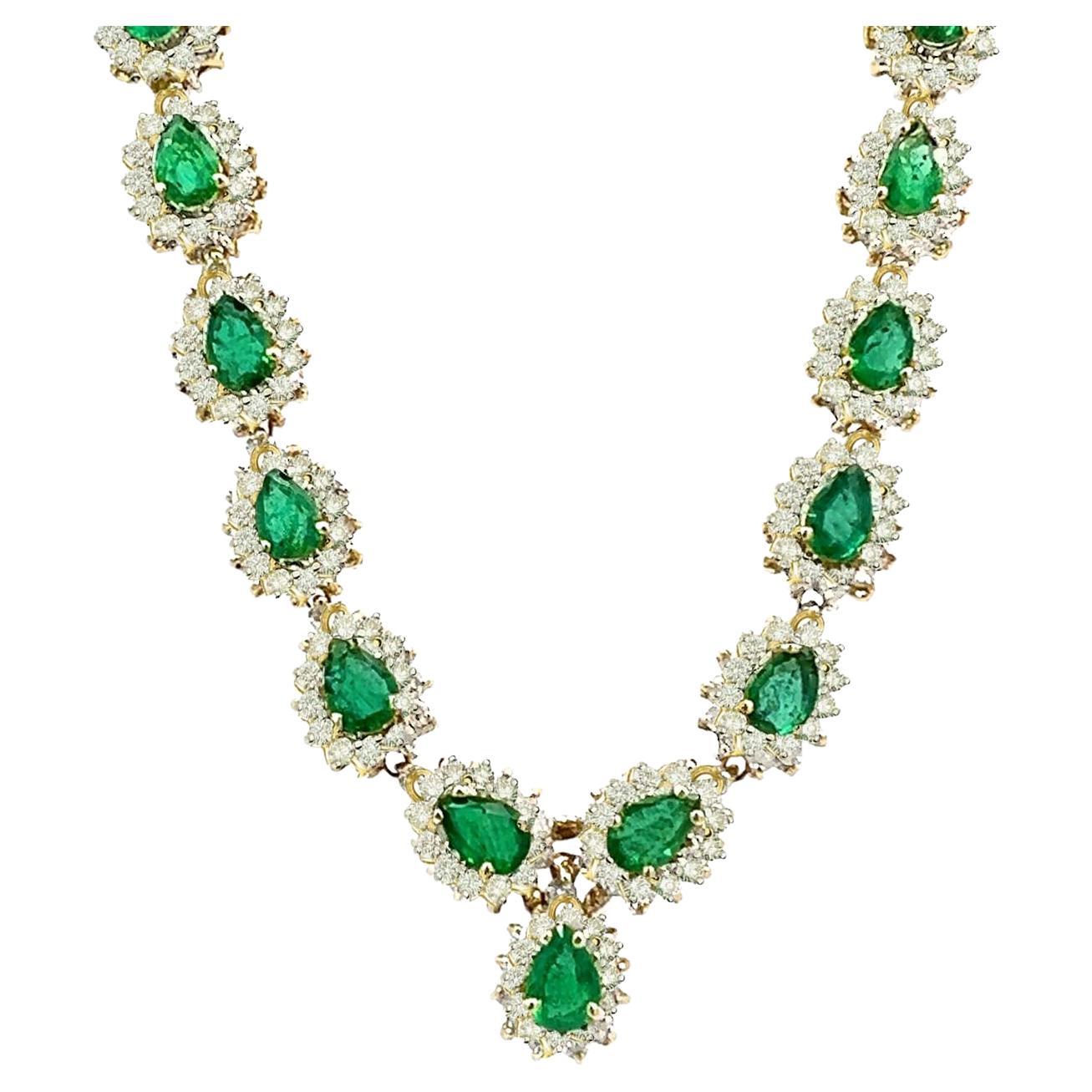 14 karat yellow gold Pear shape emerald with round brilliant white diamond halo tennis link necklace.
Crafted with precision and care, this necklace boasts a stunning arrangement of 41 pear-shaped emeralds, totaling approximately 10.50 carats,
