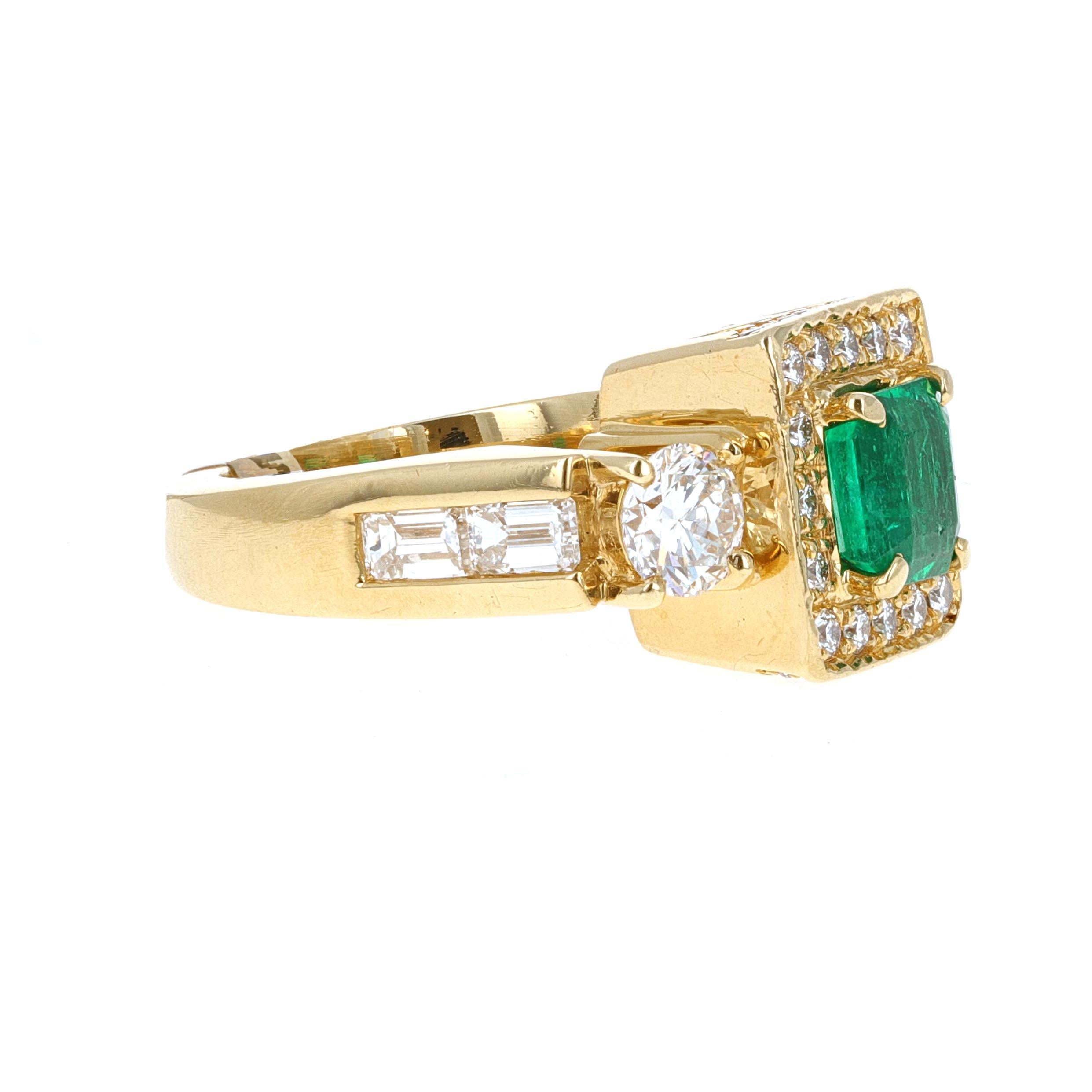 18 karat yellow gold emerald and diamond three-stone ring. The center stone is an estimated 1.30 carats, it is an emerald cut emerald. There are 32 diamonds around the center stone estimated to weigh 0.30 carats total weight. The side stones are