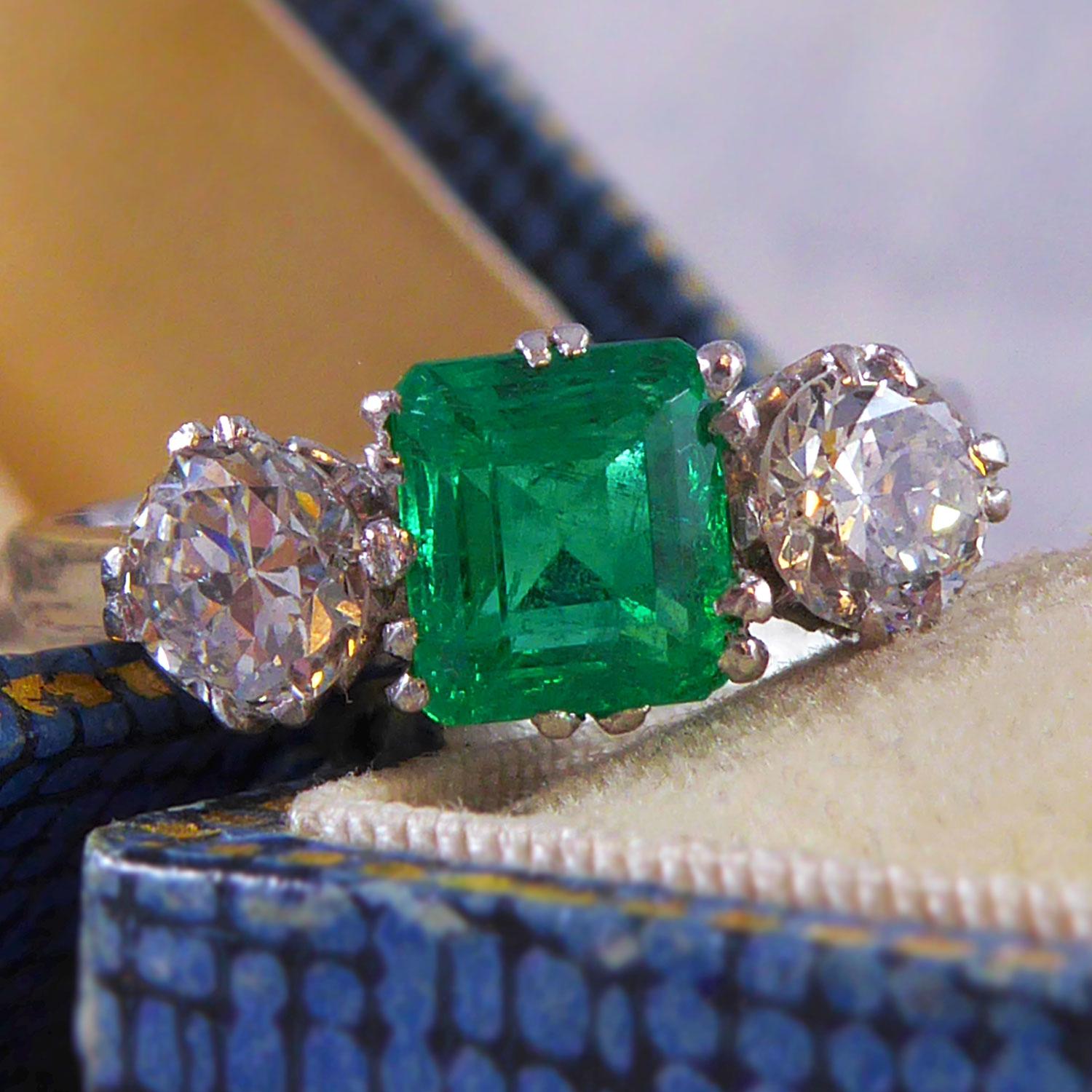 Emerald Cut Emerald and Diamond Three-Stone Engagement Ring