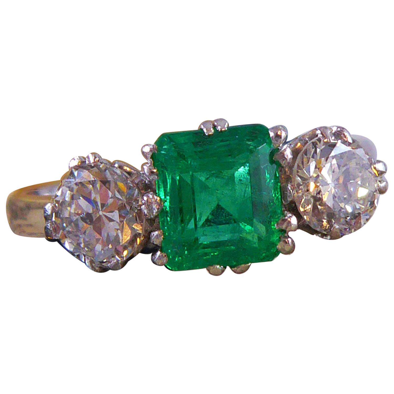 Emerald and Diamond Three-Stone Engagement Ring